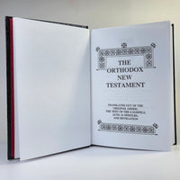 Open book titled 'The Orthodox New Testament' on a white background